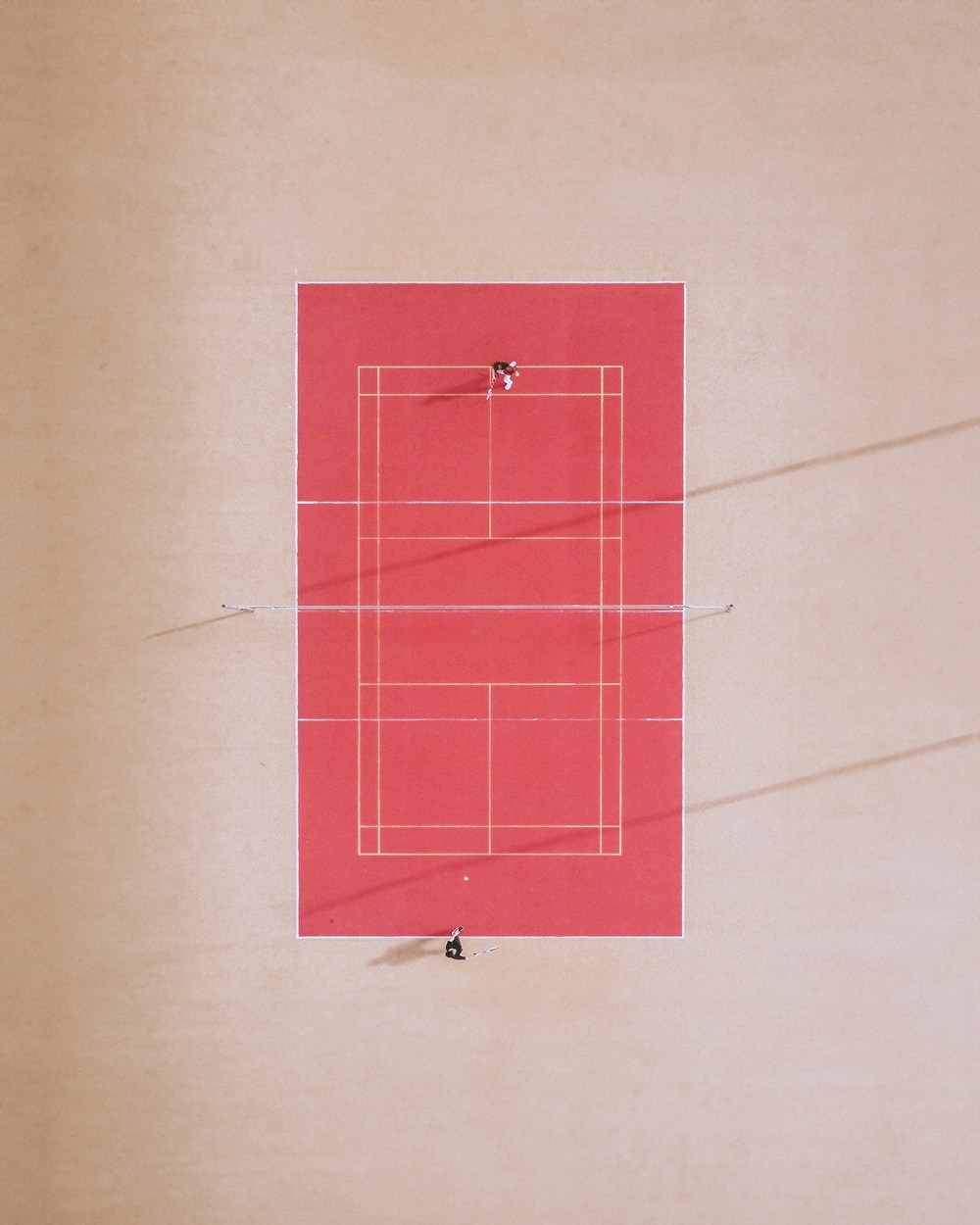 Red clay tennis court overhead
